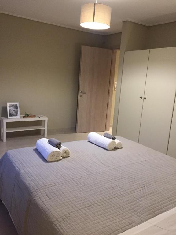 Postel nebo postele na pokoji v ubytování ImertI Apartment