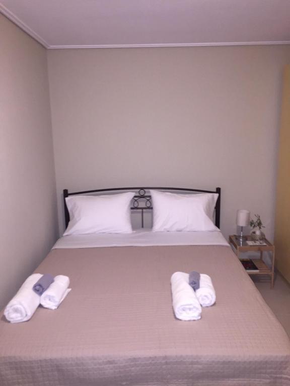 Postel nebo postele na pokoji v ubytování ImertI Apartment