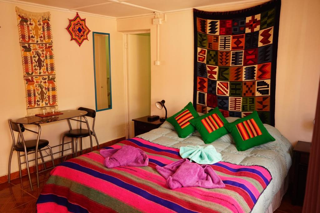 Letto o letti in una camera di Hostal Campo Base