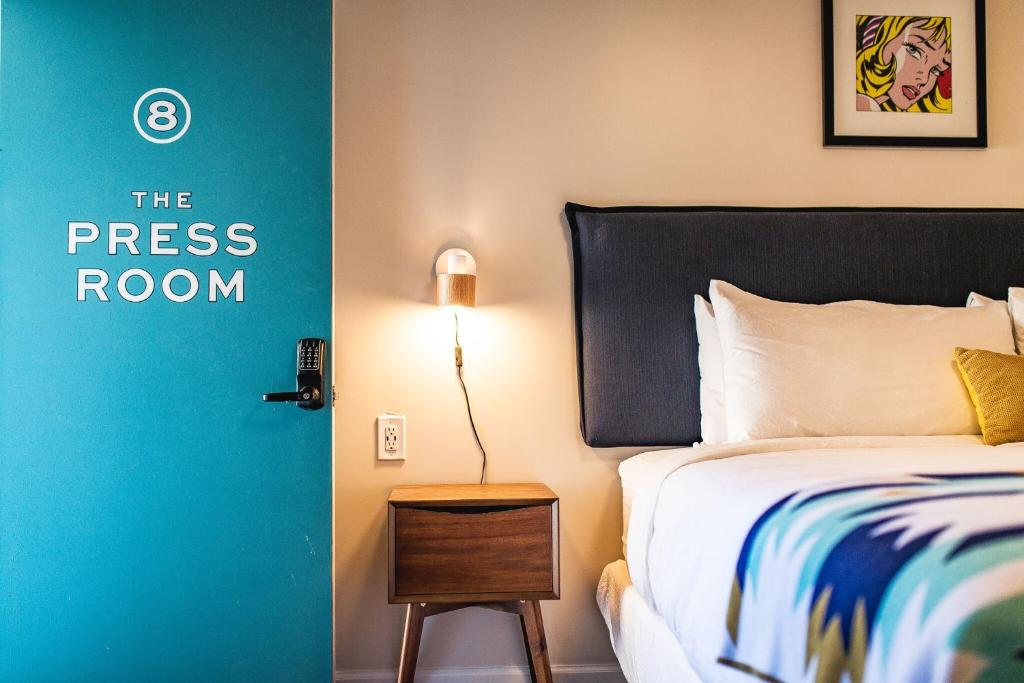 Voodi või voodid majutusasutuse Stonewall Motor Lodge toas