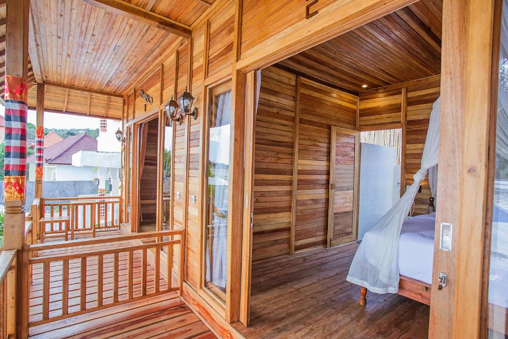 Wooden Beach Sunset Cottages - Deluxe Double Room With Sea View
