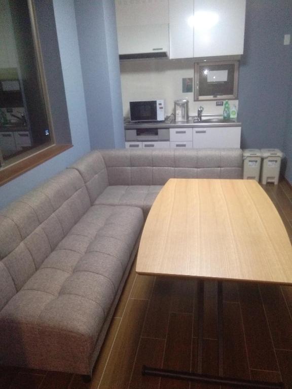 Kuchyň nebo kuchyňský kout v ubytování Nice Hostel Yahiro