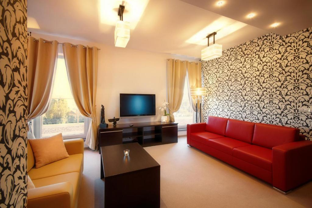 TV a/nebo společenská místnost v ubytování Hotton Hotel