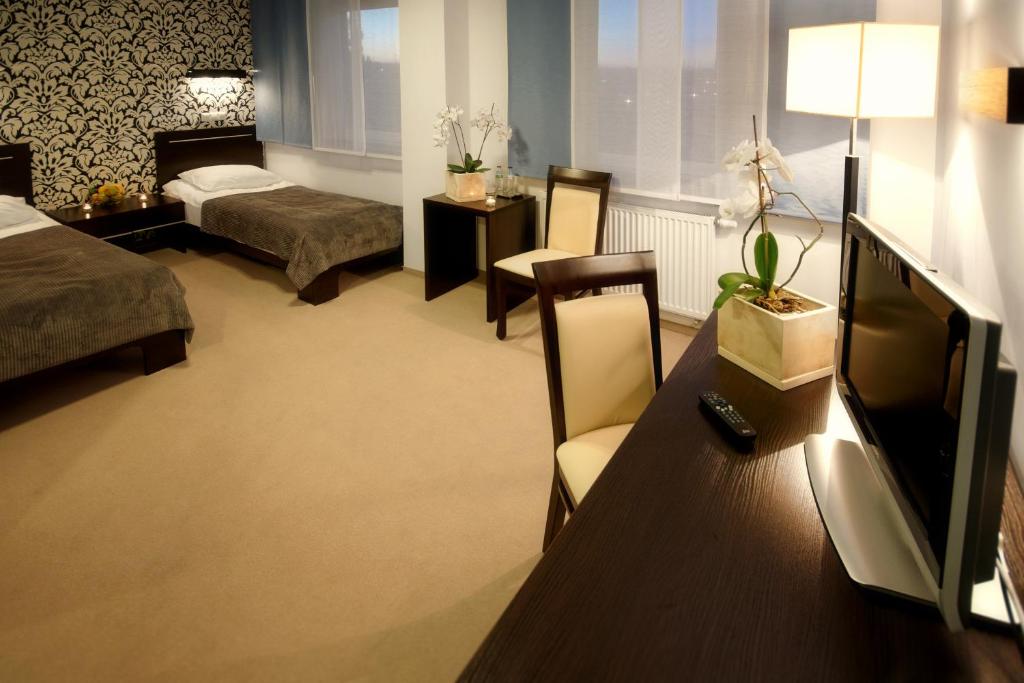 Postel nebo postele na pokoji v ubytování Hotton Hotel