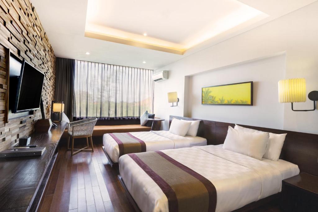 TV a/nebo společenská místnost v ubytování Watermark Hotel & Spa Bali
