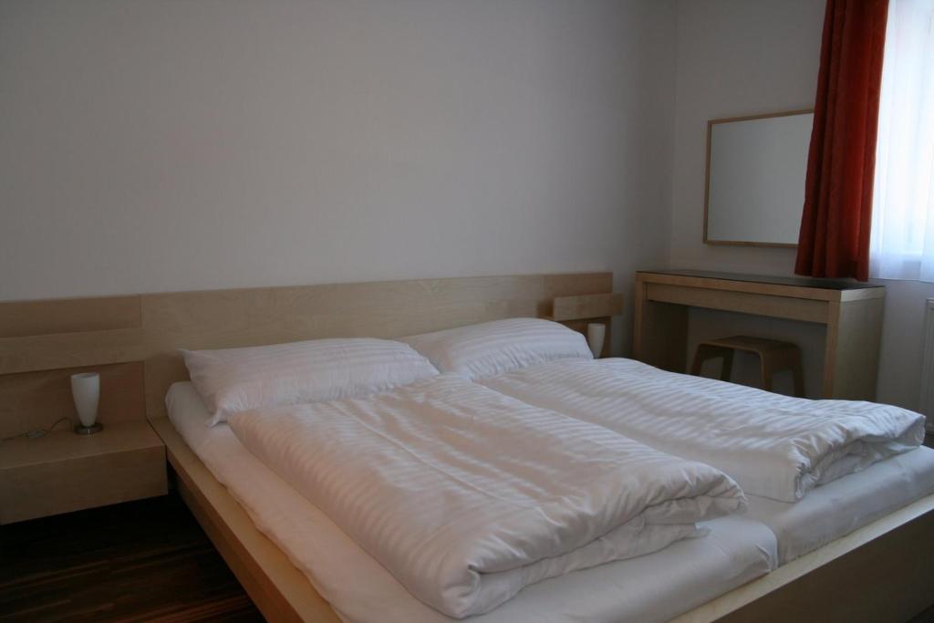 Postel nebo postele na pokoji v ubytování Appartement Crystal by Schladmingurlaub
