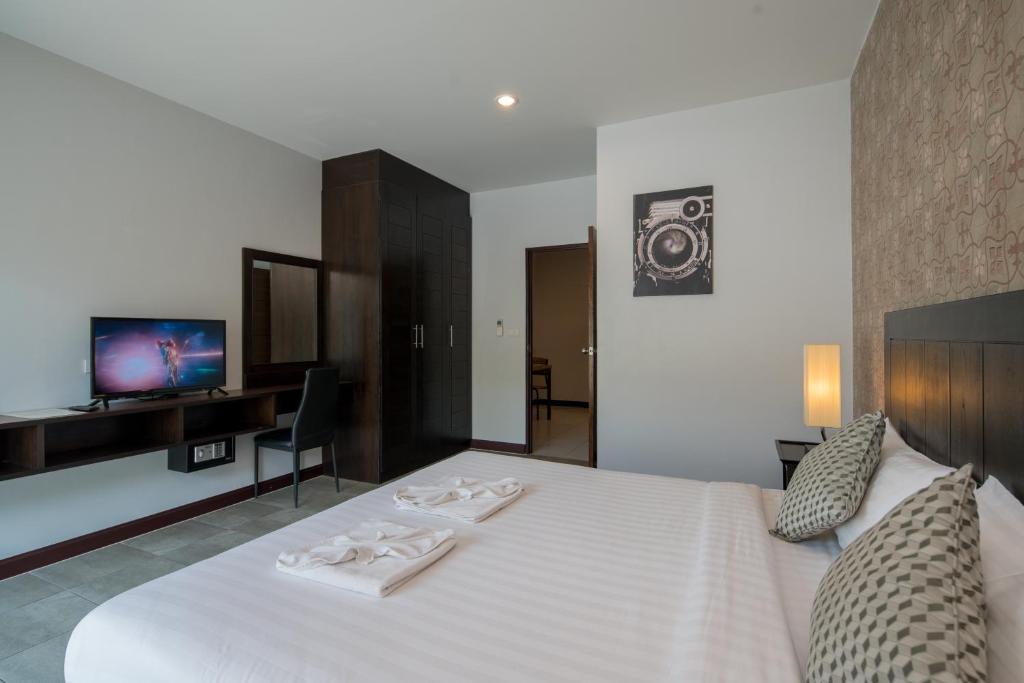 TV a/nebo společenská místnost v ubytování Amarin Hotel Patong