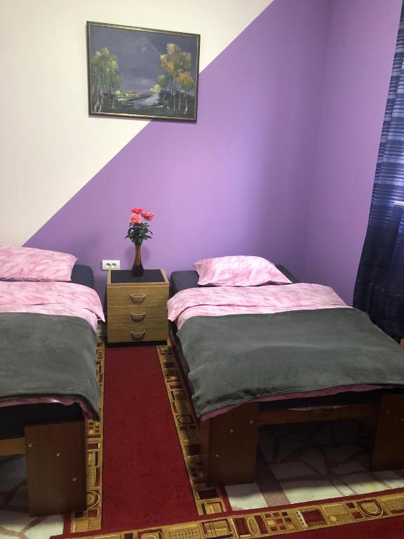 Postel nebo postele na pokoji v ubytování Swiss Hostel
