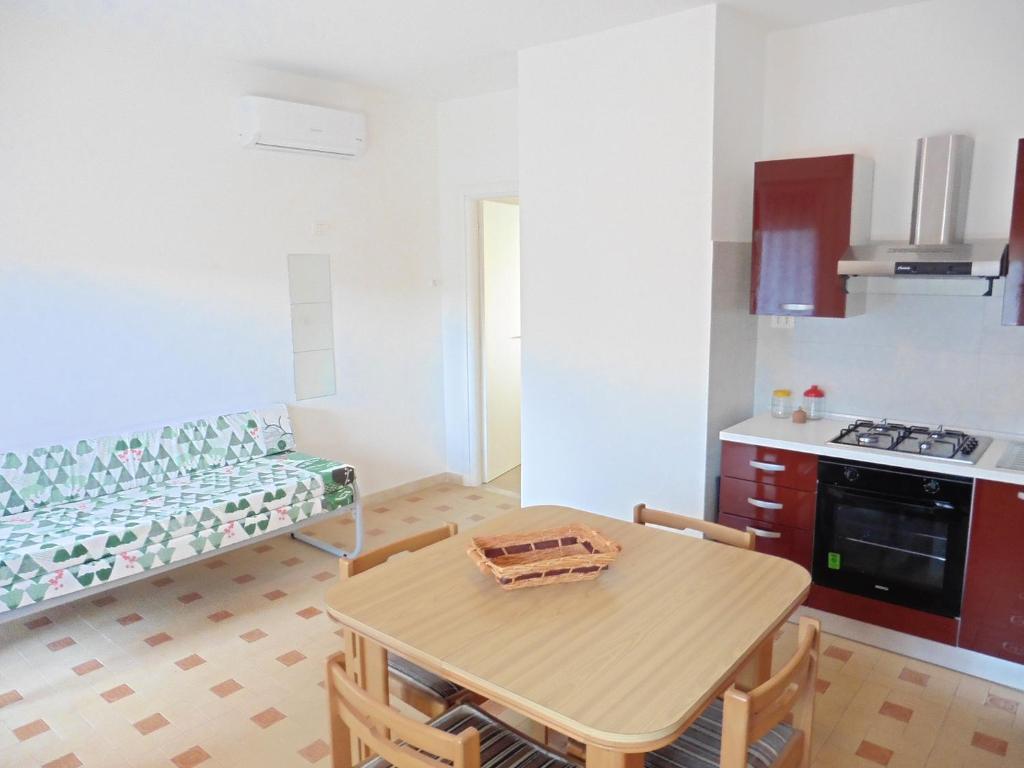 A kitchen or kitchenette at Appartamento Caravaggio