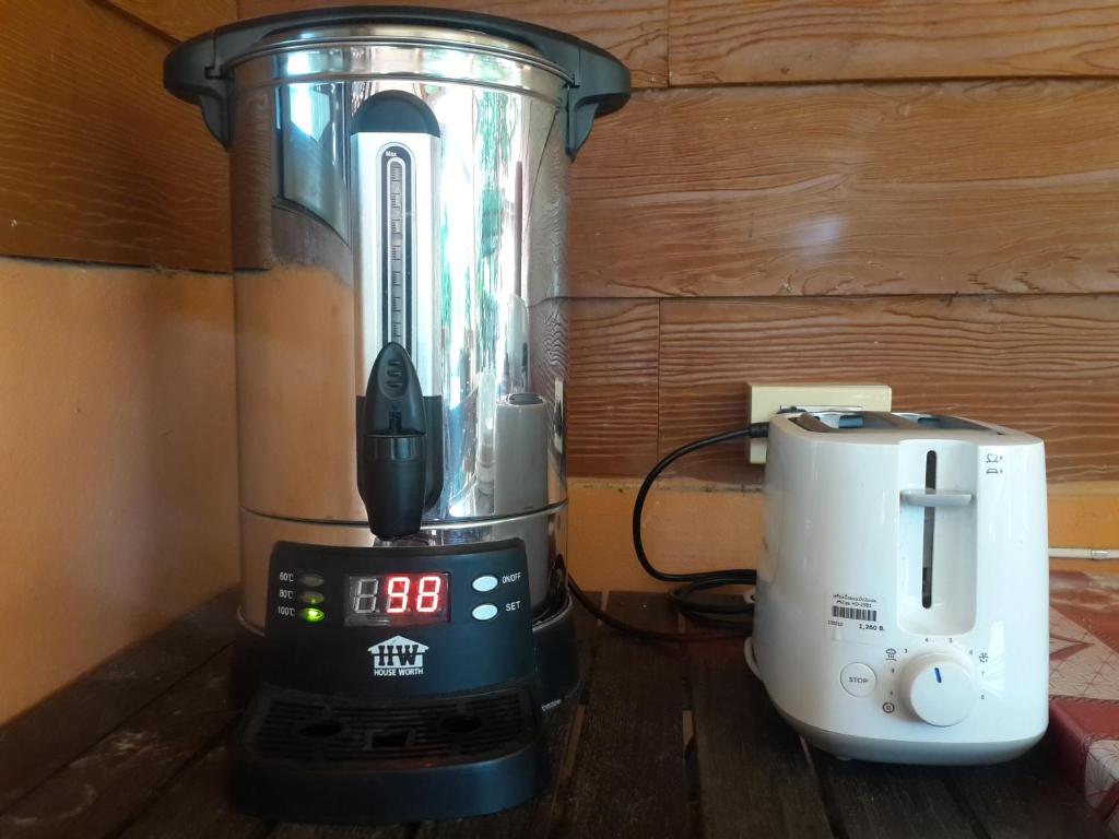 Příslušenství pro přípravu čaje a kávy v ubytování Phu View Guesthouse