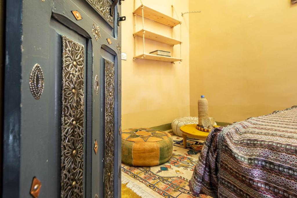Postel nebo postele na pokoji v ubytování Riad Belko