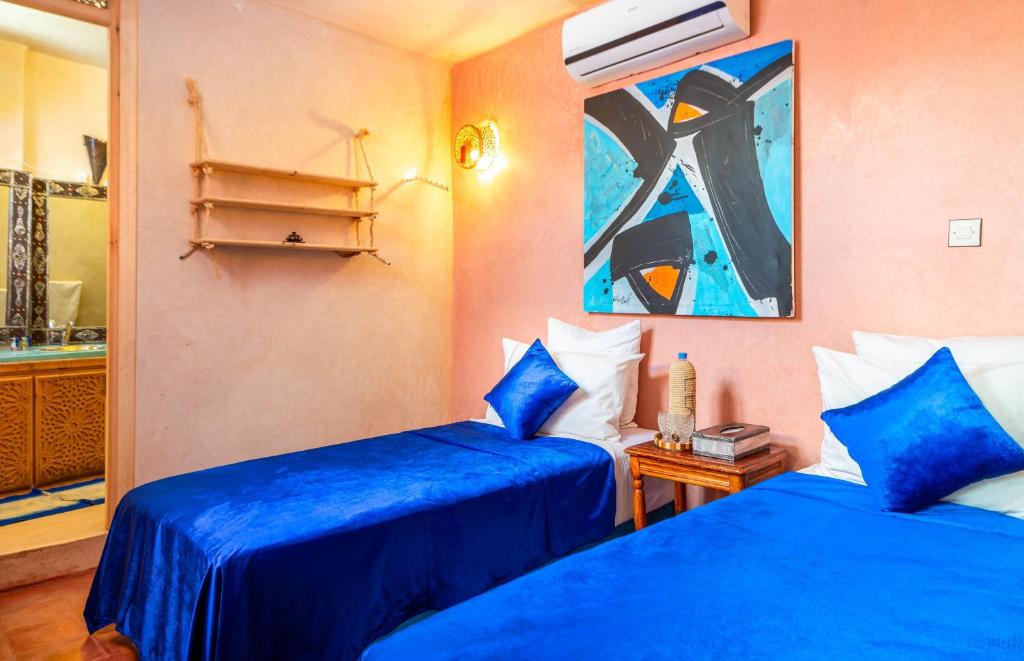 Postel nebo postele na pokoji v ubytování Riad Belko