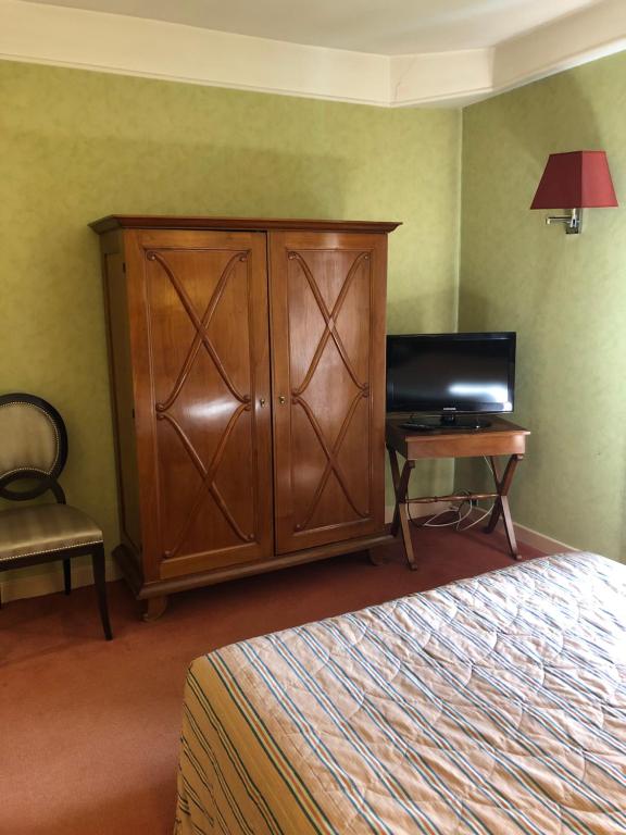Postel nebo postele na pokoji v ubytování LE CABOUILLET