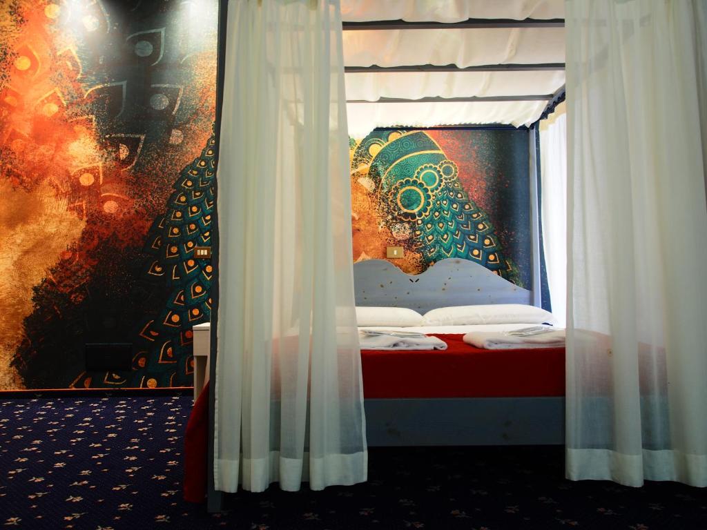 Posteľ alebo postele v izbe v ubytovaní Hotel Parco Fola