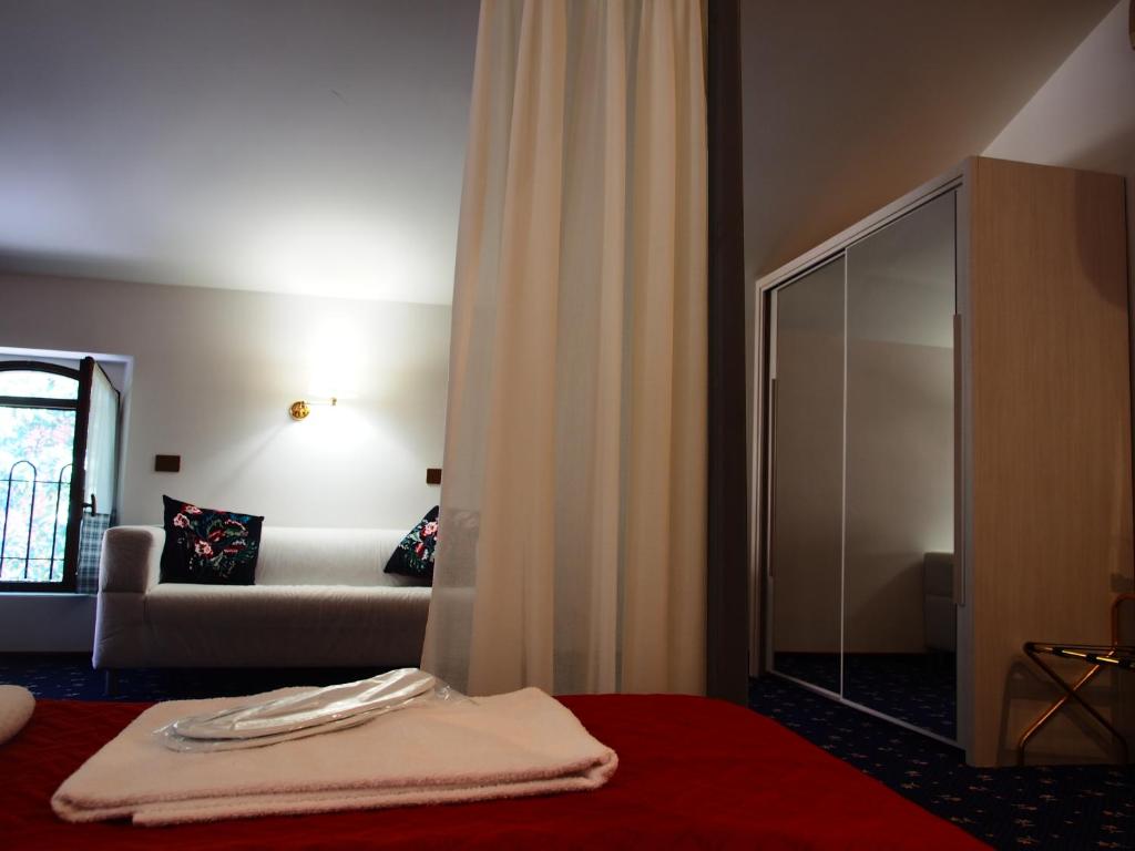 Posteľ alebo postele v izbe v ubytovaní Hotel Parco Fola