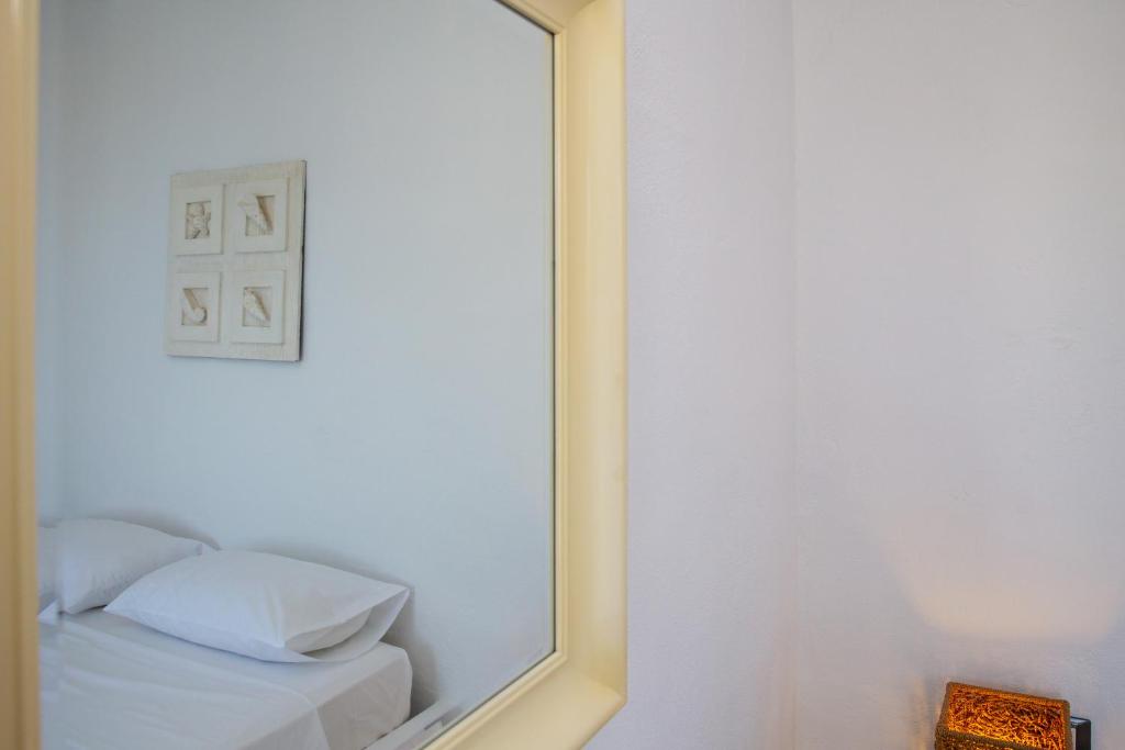 Postel nebo postele na pokoji v ubytování Pontoria Stegna Studios
