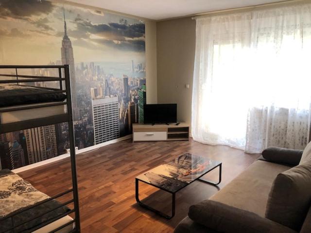 a living room with a view of a city at Monteur Suite Rodenbach in Rodenbach