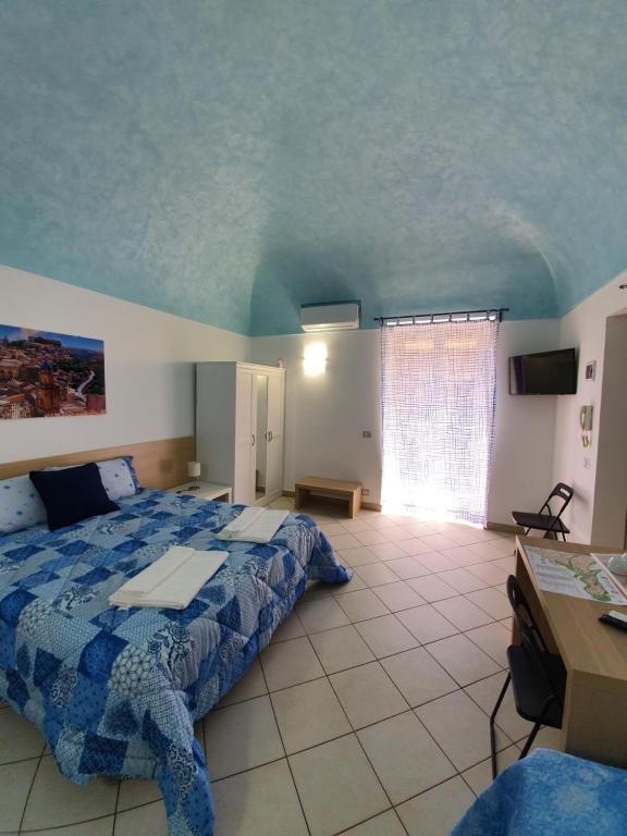 Postel nebo postele na pokoji v ubytování Ragusa Terra Priziusa