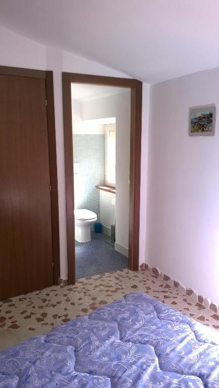 Postel nebo postele na pokoji v ubytování B&B I Tre Bassotti