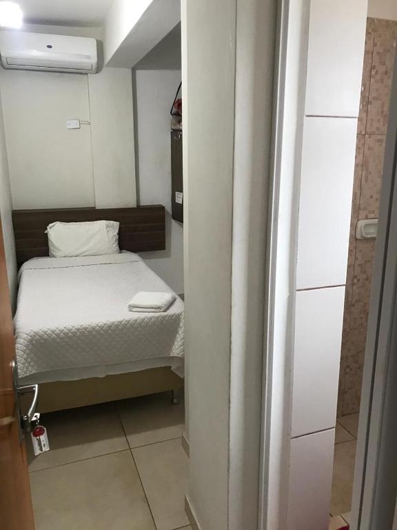 Postel nebo postele na pokoji v ubytování Hotel Sur Brasil