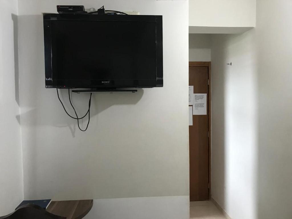 TV a/nebo společenská místnost v ubytování Hotel Sur Brasil