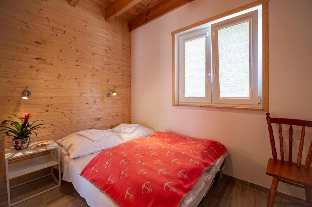Postel nebo postele na pokoji v ubytování Domki Mewa