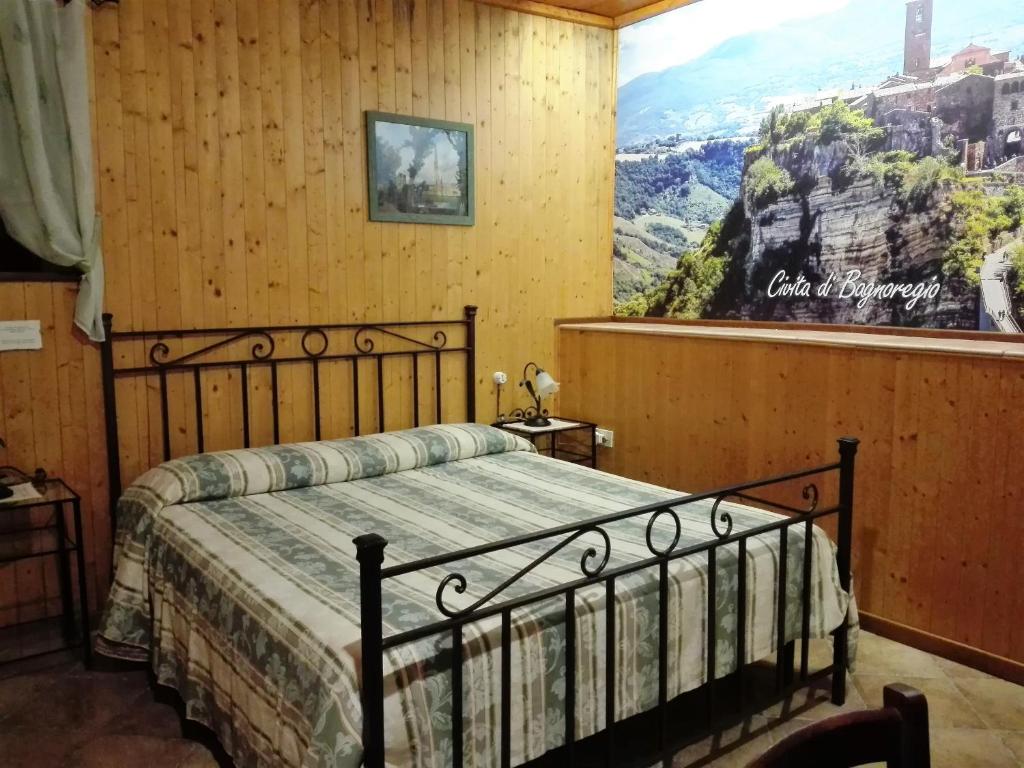 Postel nebo postele na pokoji v ubytování B&B La Quercia