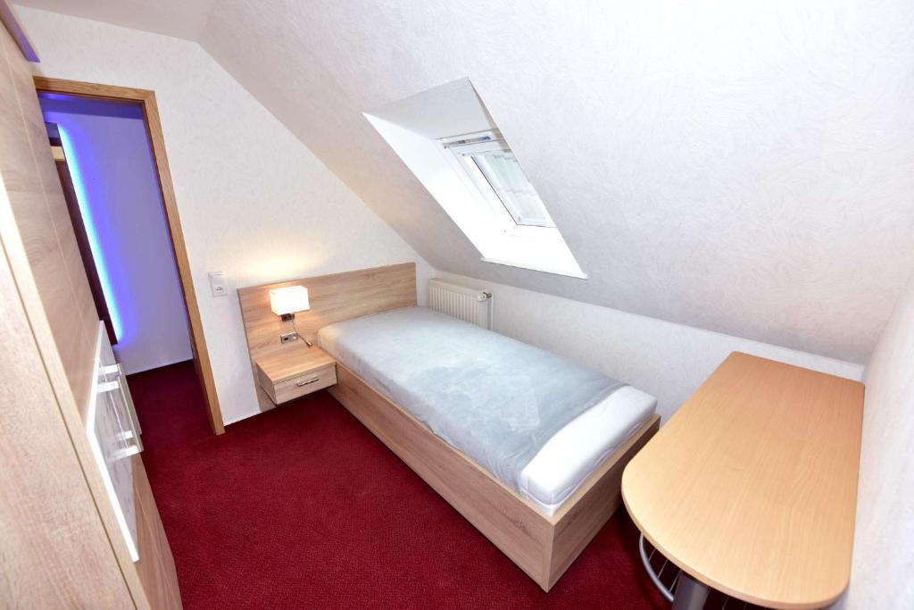 Postel nebo postele na pokoji v ubytování Hotel-England
