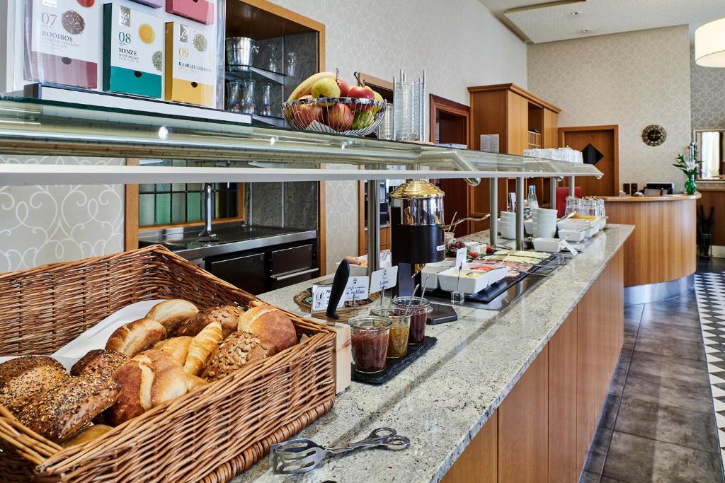 Kuchyň nebo kuchyňský kout v ubytování Dom Hotel
