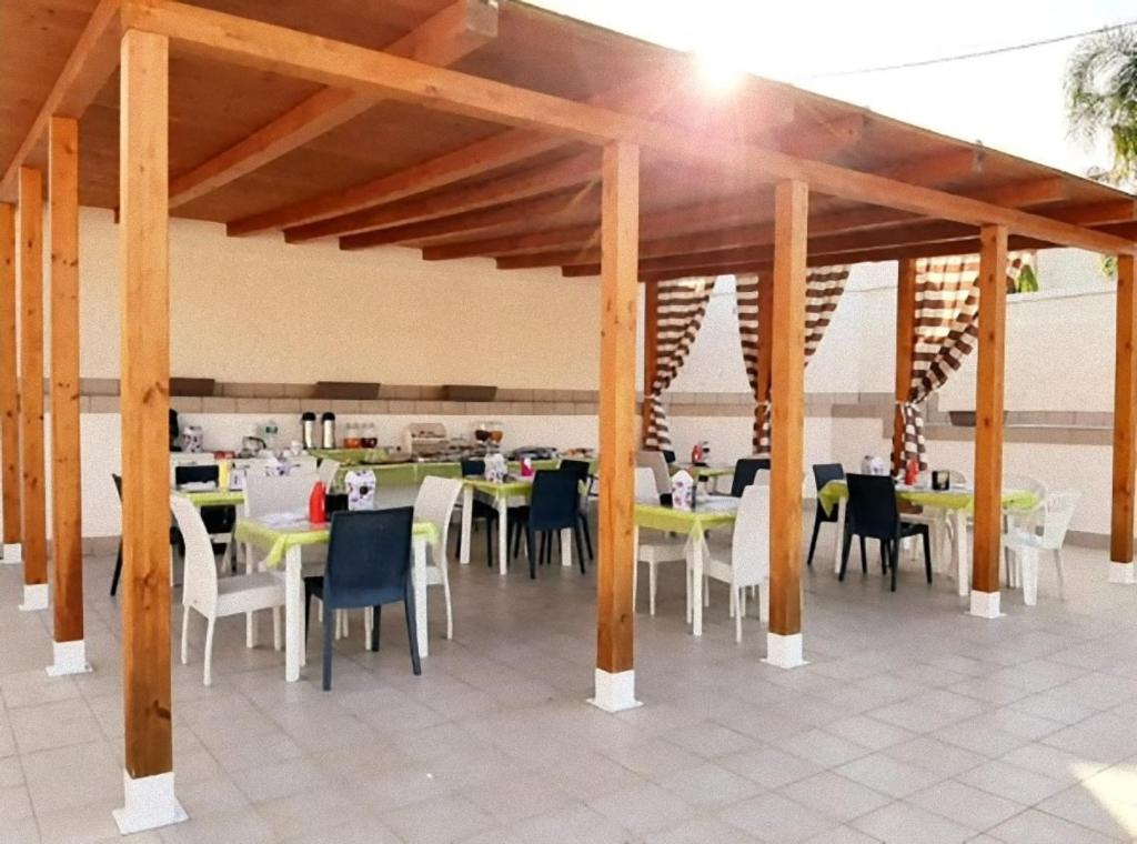 Reštaurácia alebo iné gastronomické zariadenie v ubytovaní B&B Villa Matari