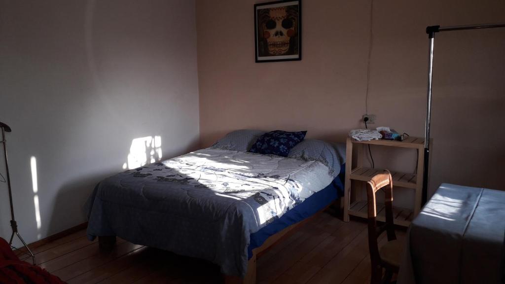 Postel nebo postele na pokoji v ubytování El laberinto hospedaje en casa