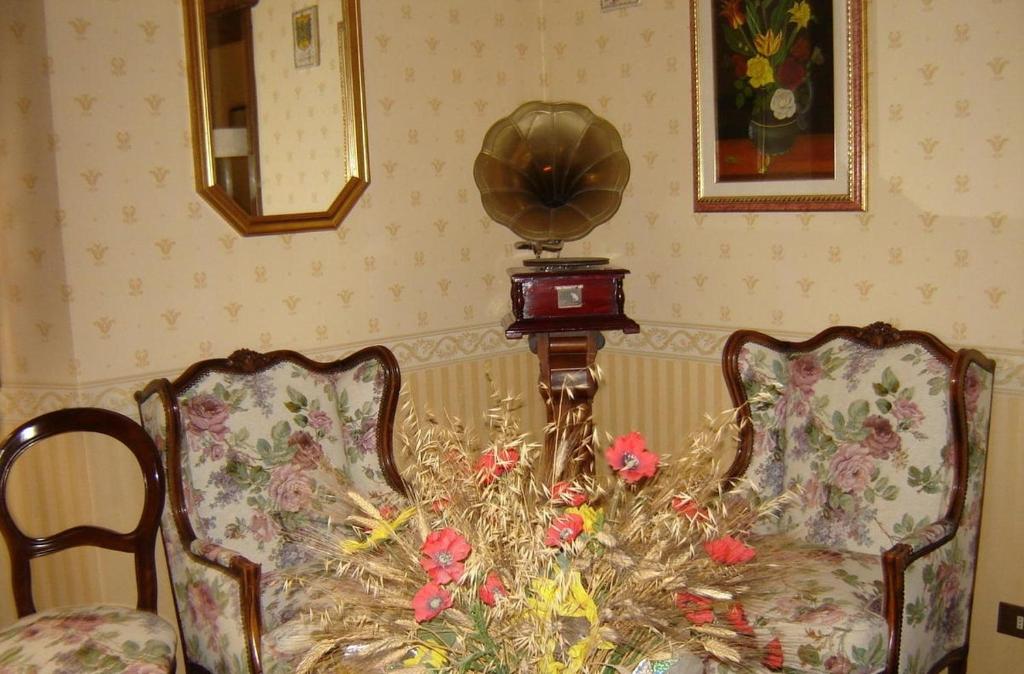 Posezení v ubytování Hotel La Rosa