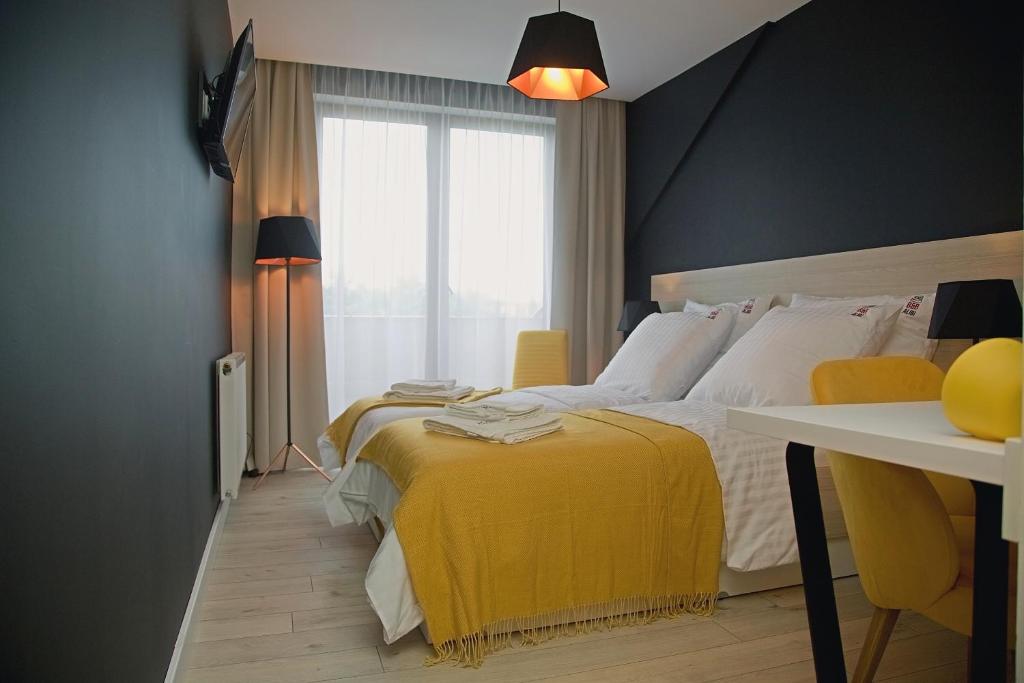 Postel nebo postele na pokoji v ubytování B&B ALIBI