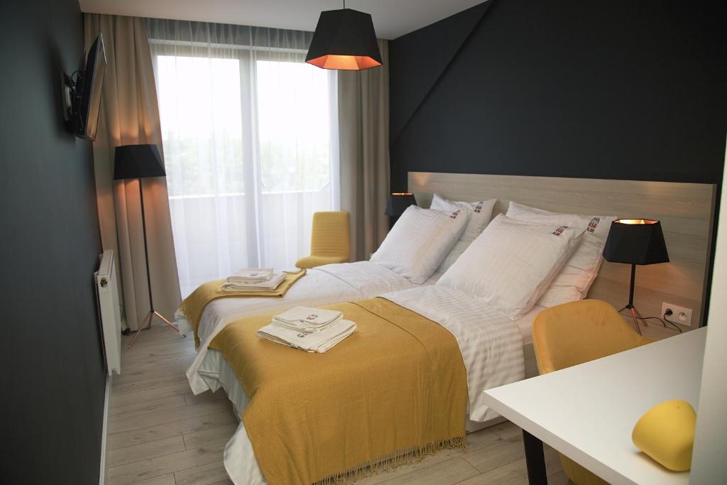 Postel nebo postele na pokoji v ubytování B&B ALIBI