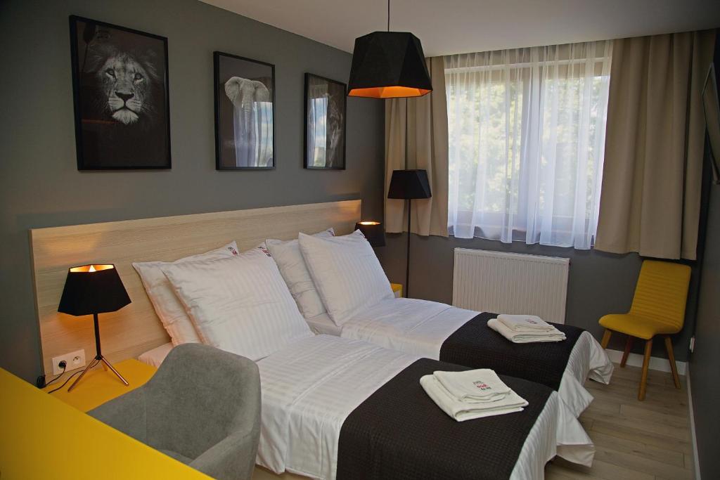 Postel nebo postele na pokoji v ubytování B&B ALIBI