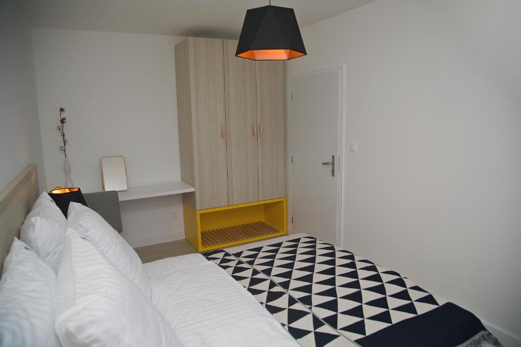 Postel nebo postele na pokoji v ubytování B&B ALIBI