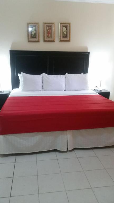Postel nebo postele na pokoji v ubytování MH Boutique Hotel