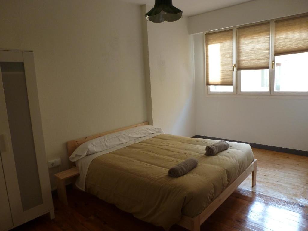 Postel nebo postele na pokoji v ubytování Hostal del Arquitecto