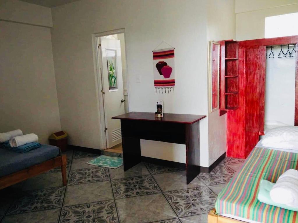 Postel nebo postele na pokoji v ubytování Mayoyao View Inn