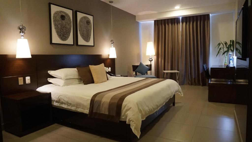 Voodi või voodid majutusasutuse Hotel Las Cascadas toas