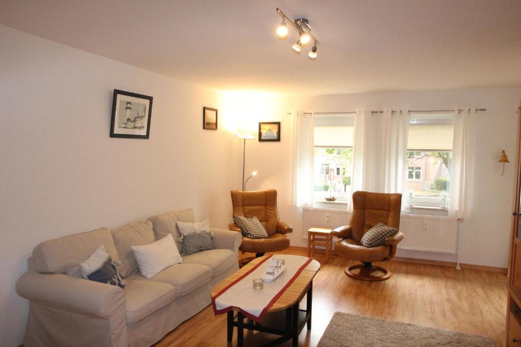 Posezení v ubytování Ferienwohnung Schönfeld auf Fehmarn