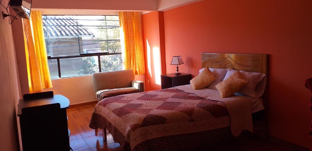 Postel nebo postele na pokoji v ubytování Kaboka Cusco Hospedaje Familiar