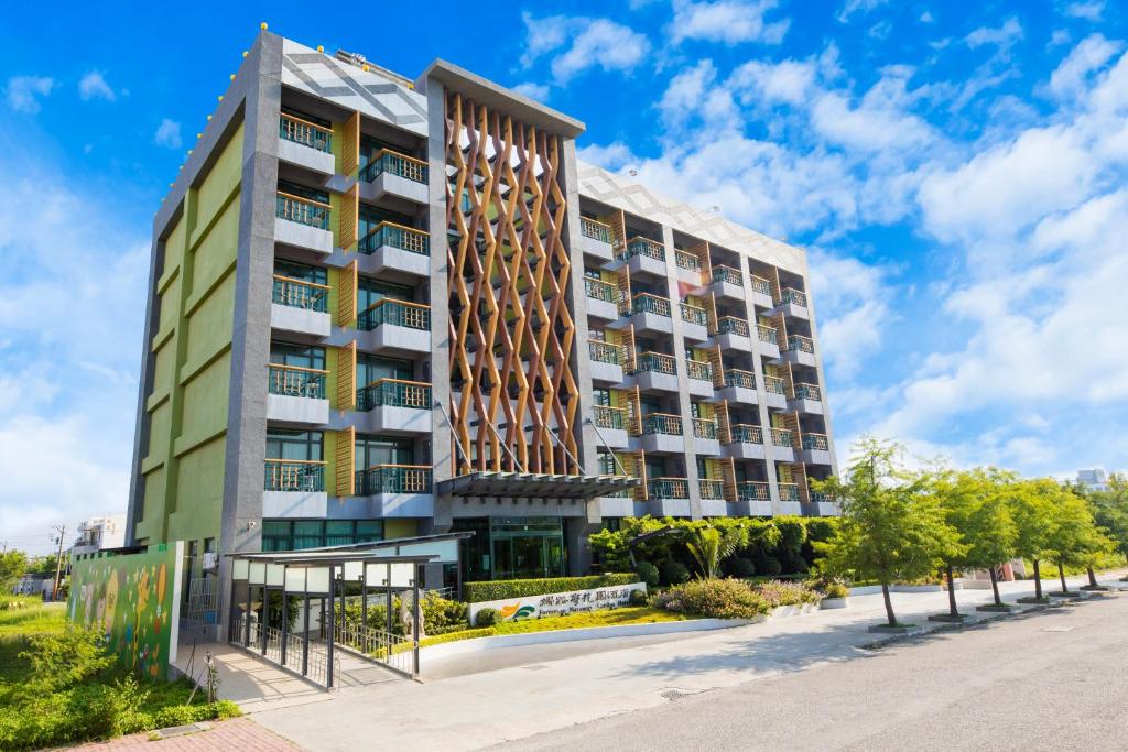 a rendering of the apartment building at the campus at Formosan Naruwan Garden Hotel in Taitung City