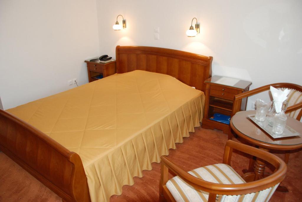 Postel nebo postele na pokoji v ubytování Hotel Sarmis