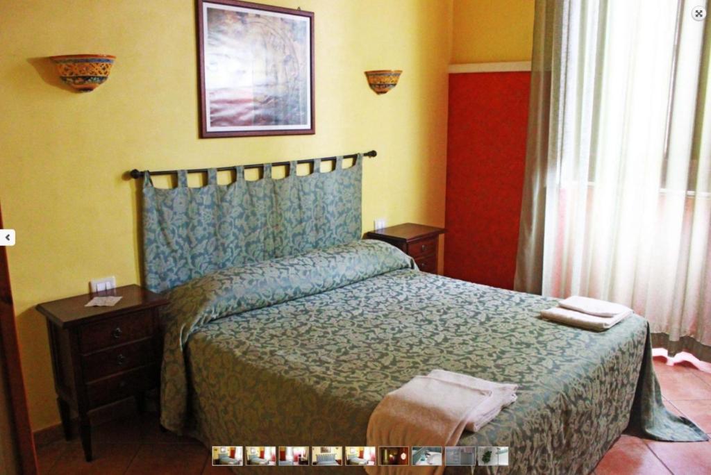 Postel nebo postele na pokoji v ubytování B&B Triskèles