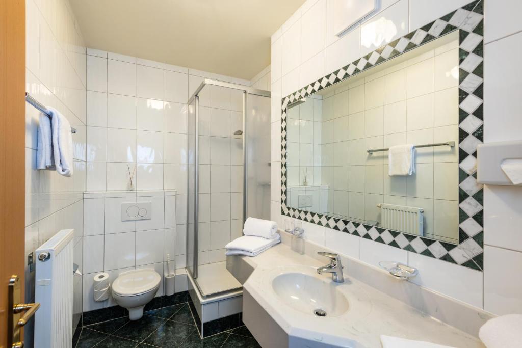 Koupelna v ubytování Hotel & Appartement Auerhahn