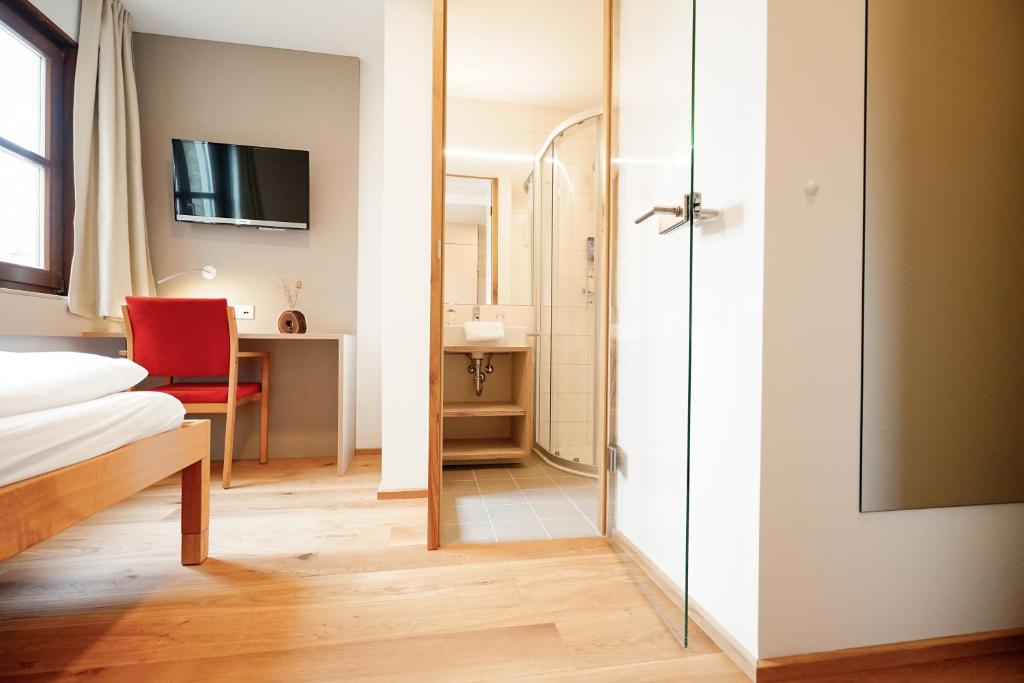 A bed or beds in a room at SPES Hotel & Seminare