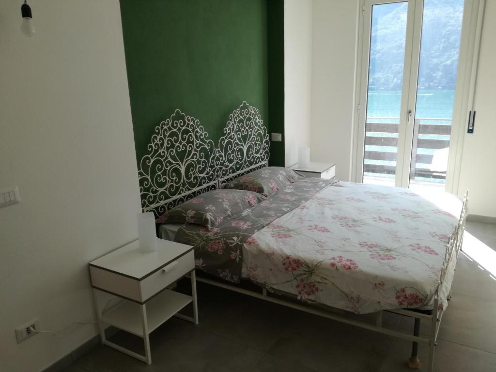 Postel nebo postele na pokoji v ubytování oleandra
