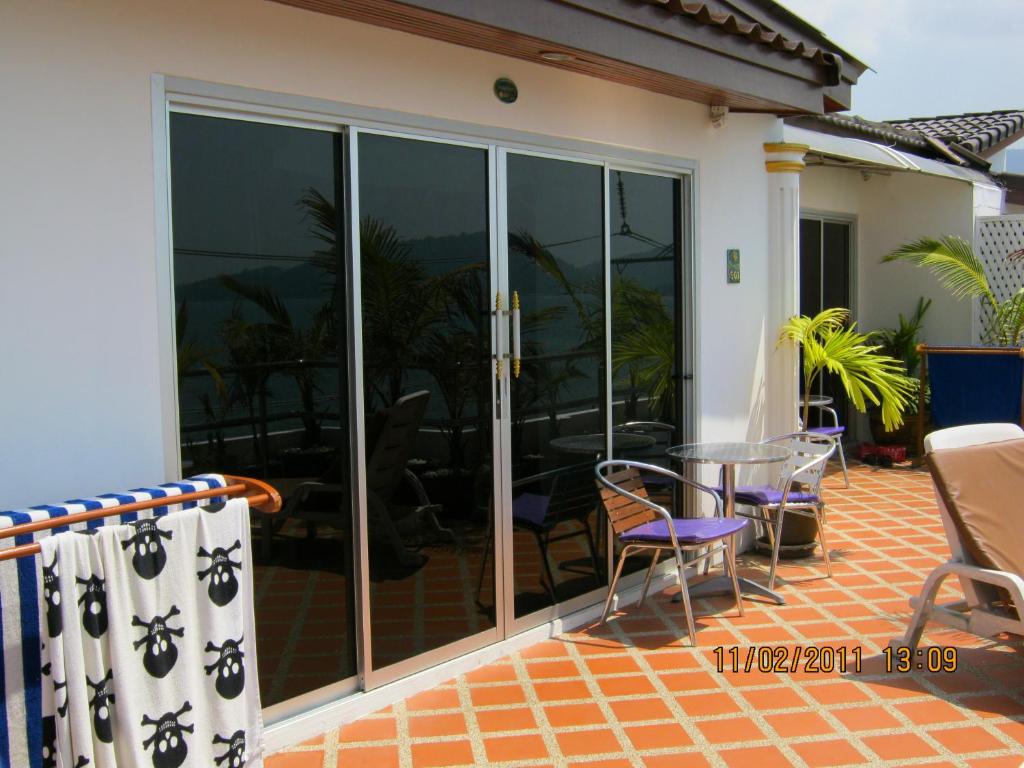 Ein Balkon oder eine Terrasse in der Unterkunft Orchid Hotel and Spa Kalim Bay