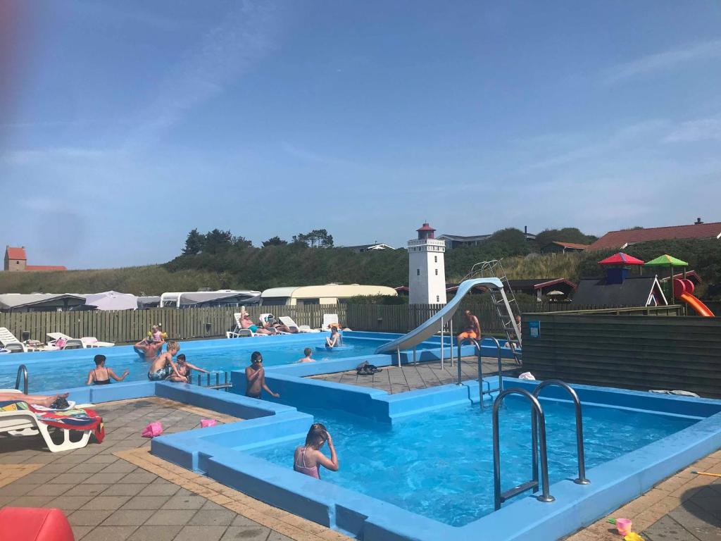 a group of people in a swimming pool at Lønstrup Egelunds Motel in Lønstrup